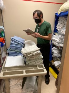 Jason working in the linen room